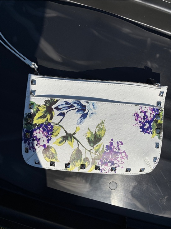 White House Black Market Handbags - White House Black Market White Floral Studded Wristlet Clutch